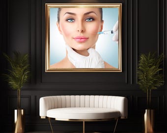 May include: A framed photo of a woman receiving a facial injection. The woman has light brown hair and is looking directly at the camera. The photo is set against a blue background.