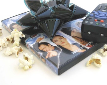 Film Reel Gift Packaging Bows - Set of 3 Bows - Repurposed from the movie The Skulls - Gift Wrapping - Upcycled 35mm Film Gift Bow