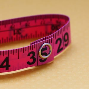 Tape Measure Bracelet in Bright Pink - Statement Jewelry created with Upcycled Measuring Tape - Vinyl Snap Bracelet - Repurposed - Trashion