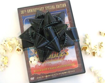 Single Film Reel Gift Packaging Bow - Repurposed from Movie Film - Gift Wrapping - Upcycled 35mm Film Gift Bow