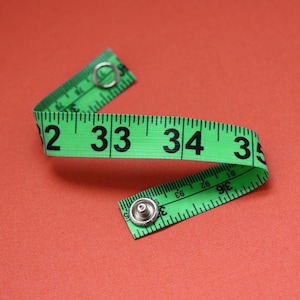 Tape Measure Bracelet in Green - Statement Jewelry created with Upcycled Measuring Tape - Vinyl Snap Bracelet - Crafty Repurposed Trashion