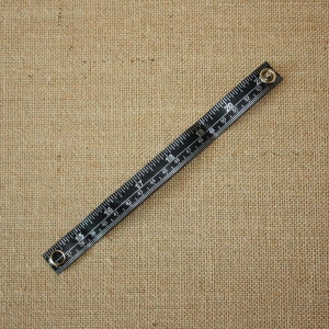 Tape Measure Bracelet in Black - Statement Jewelry created with Upcycled Measuring Tape - Vinyl Snap Bracelet - Crafty Repurposed Trashion
