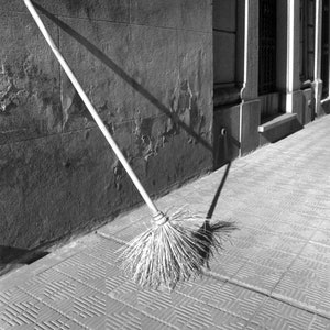 Black and White Photo of a Broom in a Cemetery in Argentina