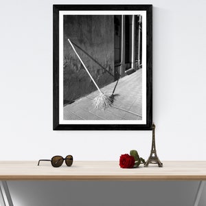 Black and White Photo of a Broom in a Cemetery in Argentina