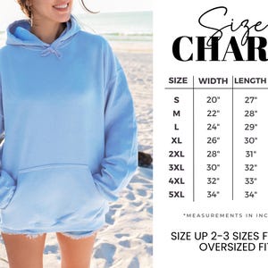 May include: Size chart for a hoodie with measurements in inches. The chart shows the width, length, and sleeve length for sizes S through 5XL. The text "Size up 2-3 sizes for an oversized fit" is also included.