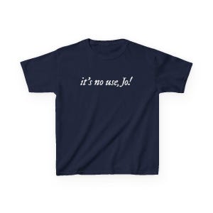 May include: Navy blue t-shirt with the white text "it's no use, Jo!" printed across the chest. The short-sleeved shirt is made of a soft material and is suitable for casual wear.