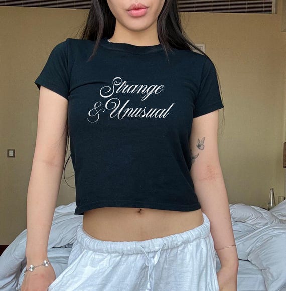Strange and Unusual Baby Tee Cult Classic Halloween Movie 90s Style Gothic Style Y2K Aesthetic Baby Tee Movie Quotes 90s Nostalgia Etsy