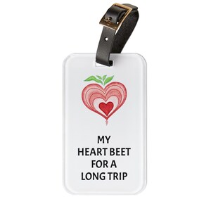 May include: White luggage tag with a red heart beet illustration and the text "My heart beet for a long trip".