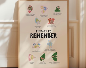以下が含まれることがあります： 「THINGS TO REMEMBER」という言葉が大きな黒い文字で書かれた額入りのポスター。ポスターには、「You are worthy and loved」や「Kindness is free」などのカラフルなイラストと肯定的なアファメーションが描かれています。