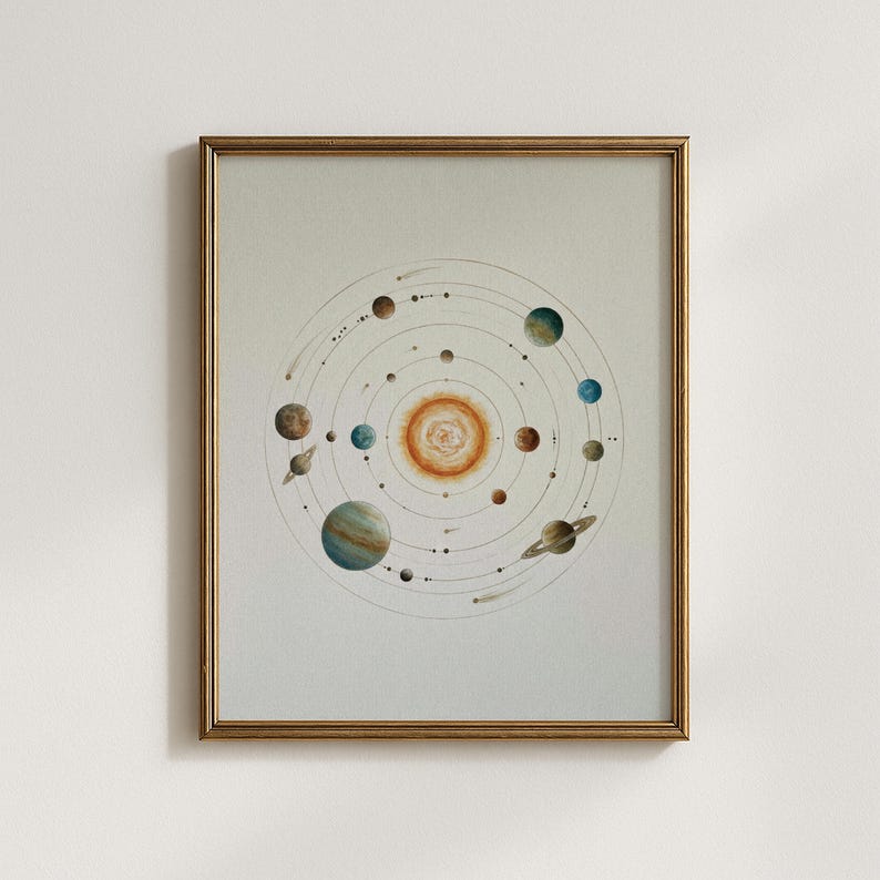 May include: Framed watercolor print of the solar system, featuring the sun at the center with planets orbiting around it. The planets are depicted in various colors, with Saturn's rings clearly visible. The frame is a warm gold color.