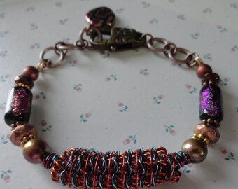Pretty Purple/Gold Foil beaded  Wire Bracelet..handmade..8" in length.