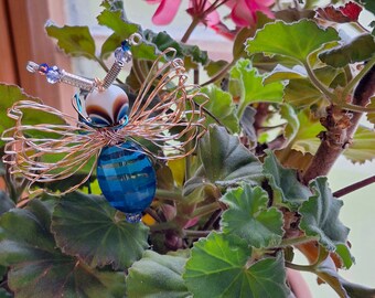 Blue Alien#9300 Bug Dragonfly with a wire plant stem...Handmade.. All ready to fly away!