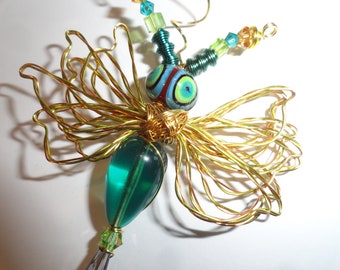 Green/Blue Alien#9302 Bug Dragonfly with a wire plant stem...Handmade.. All ready to fly away!