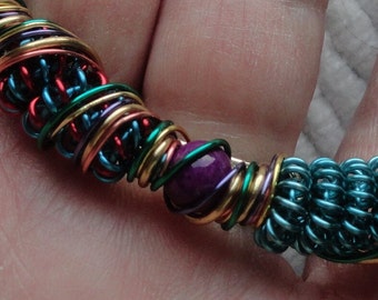 Pretty Purple/Gold Foil beaded  Wire Bracelet..handmade..8" in length.