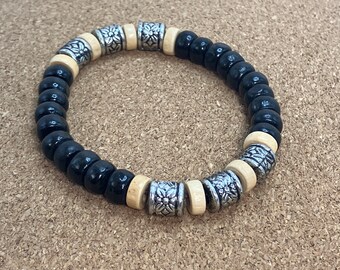 Pulsera de cuentas de madera negra y plateada