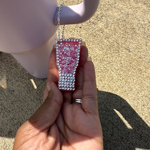 Dijes para tazas y bolsos