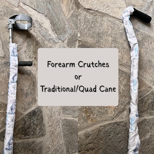 May include: Image features forearm crutches and a traditional cane, both with a white fabric wrap. The fabric has a nautical design with sailboats and blue accents. The text on the image reads "Forearm Crutches or Traditional/Quad Cane."