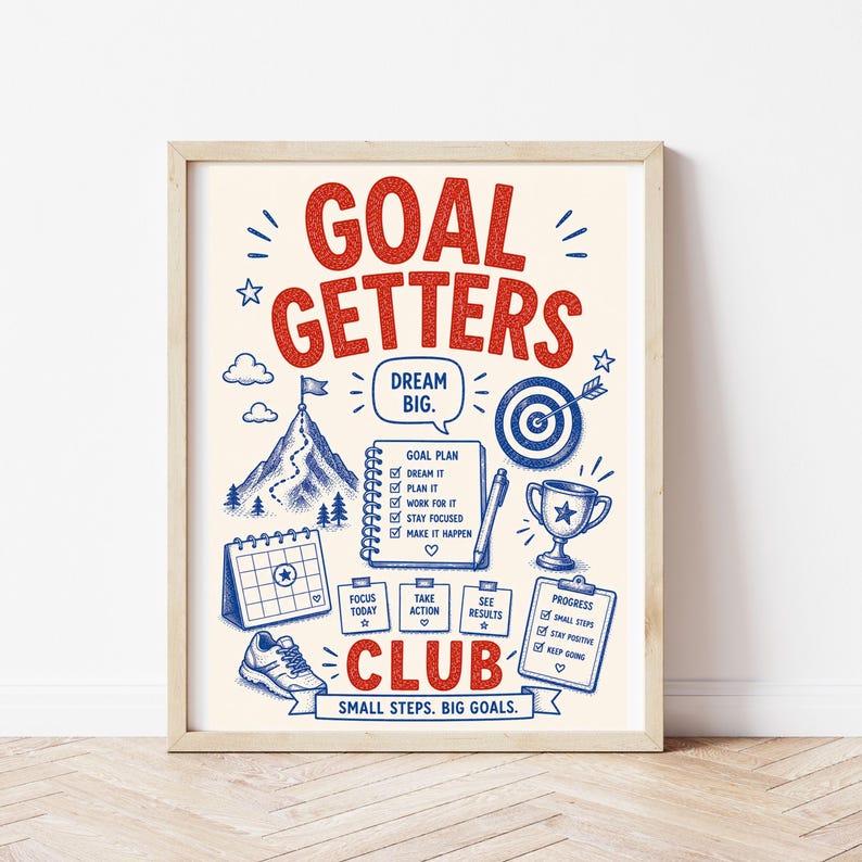 May include: A framed poster with a cream background featuring red and blue illustrations and text. The text reads GOAL GETTERS CLUB, DREAM BIG, and SMALL STEPS. BIG GOALS. Graphics include a mountain, target, trophy, calendar, and checklists.