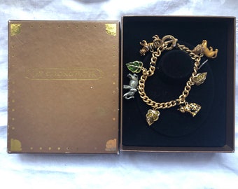 Charming Gold Tone Enamel and Swarovski Crystal Jay Strongwater Toggle Jungle Charm Bracelet