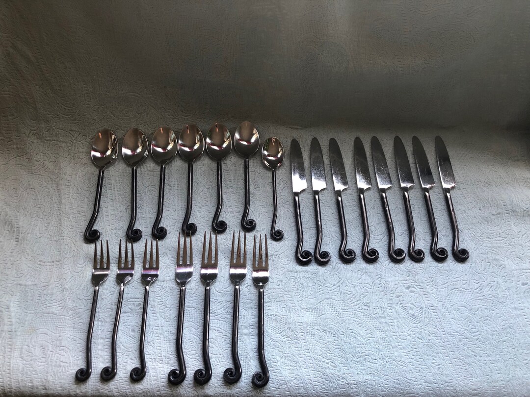 22 Piece Partial Set of Vintage Gourmet Settings Treble Clef Stainless Steel and Wrought Iron