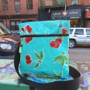 Turquoise Cherry Print Oil Cloth Messenger Saddle Bag, Cross body Vinyl Shoulder Bag