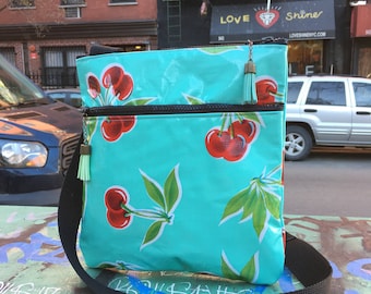 Turquoise Cherry Print Oil Cloth Messenger Saddle Bag, Cross body Vinyl Shoulder Bag