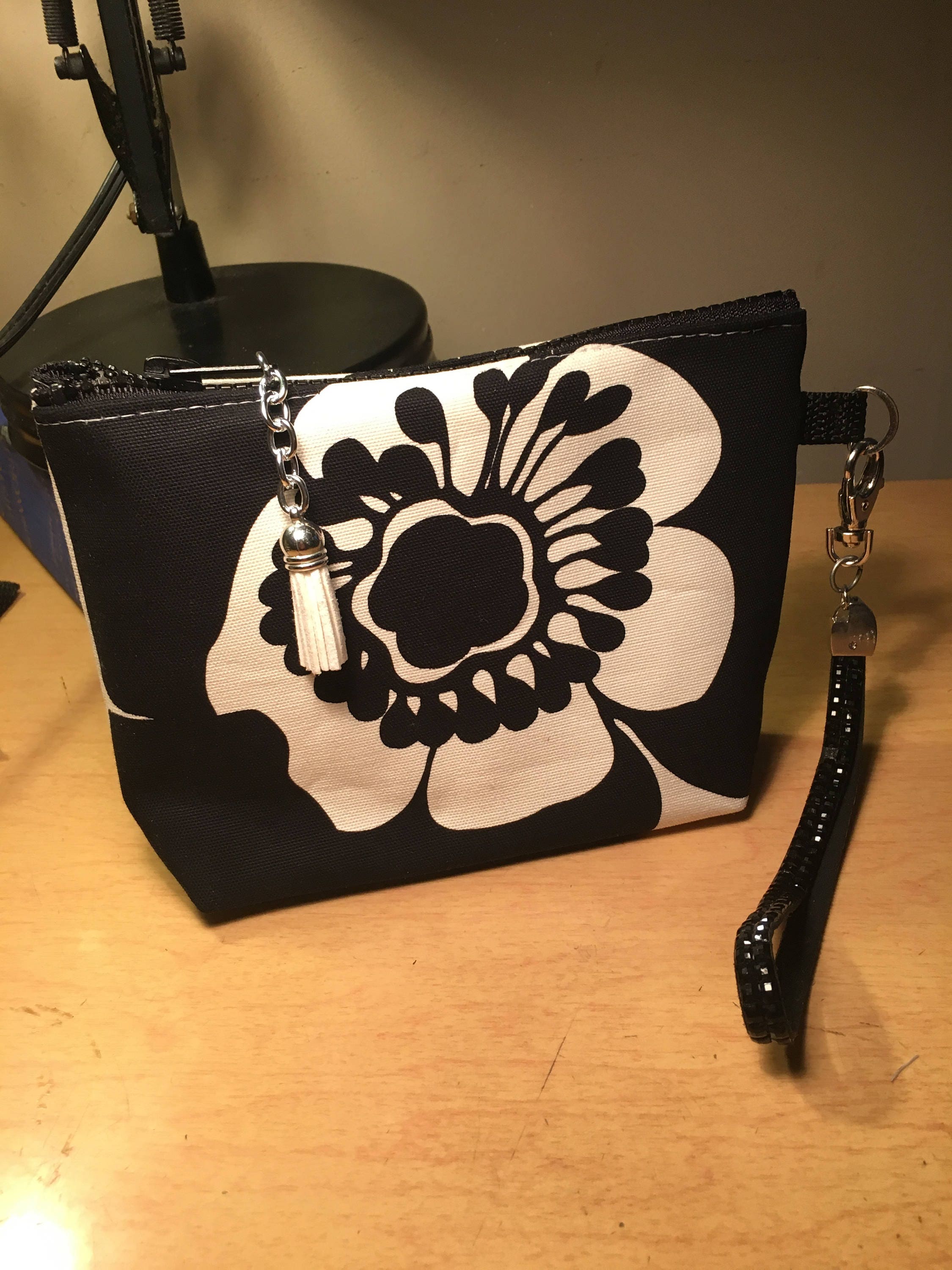 white clutch bag with wrist strap