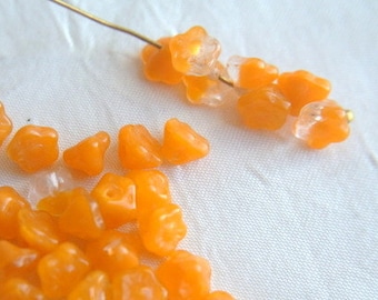 25 Glass beads, Czech glass flower beads bell shape opaque orange 7mmx5mm, NEW
