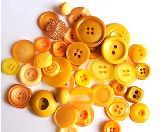 40 Buttons, antique and vintage plastic yellow buttons, assorted shapes and shades