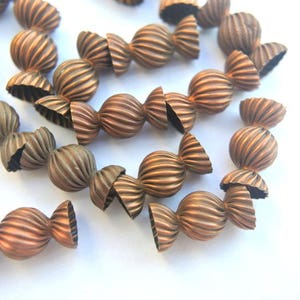 10 Vintage metal beads 15mmx7mm, copper metal, beautiful unique design