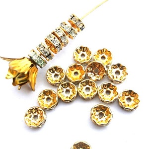 6 Vintage Swarovski rondelle beads clear crystal rhinestone on gold color base 7mm spacer beads