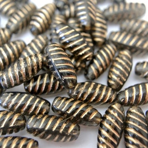 12 Czech glass beads,  14mmx7mm black with gold shade Czech beads