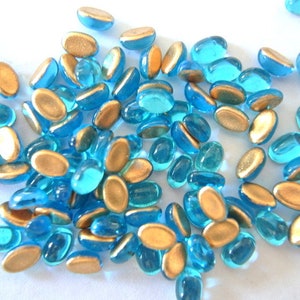 16 Cabochões de vidro vintage, formato oval, folha de ouro azul sunique, 5 mm x 3,5 mm, Swarovski