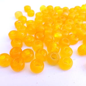 25 Vintage glass beads ring shape 9mmx6mm large hole yellow
