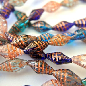 12 Czech glass beads,  15mmx7mm , mix colors with copper trim
