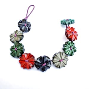 Button bracelet made of antique vintage flower plastic buttons in rare color and design