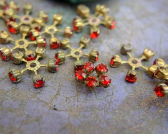 2 SWAROVSKI CRYSTAL beads, vintage,  flower shape brass setting with red crystal- RARE