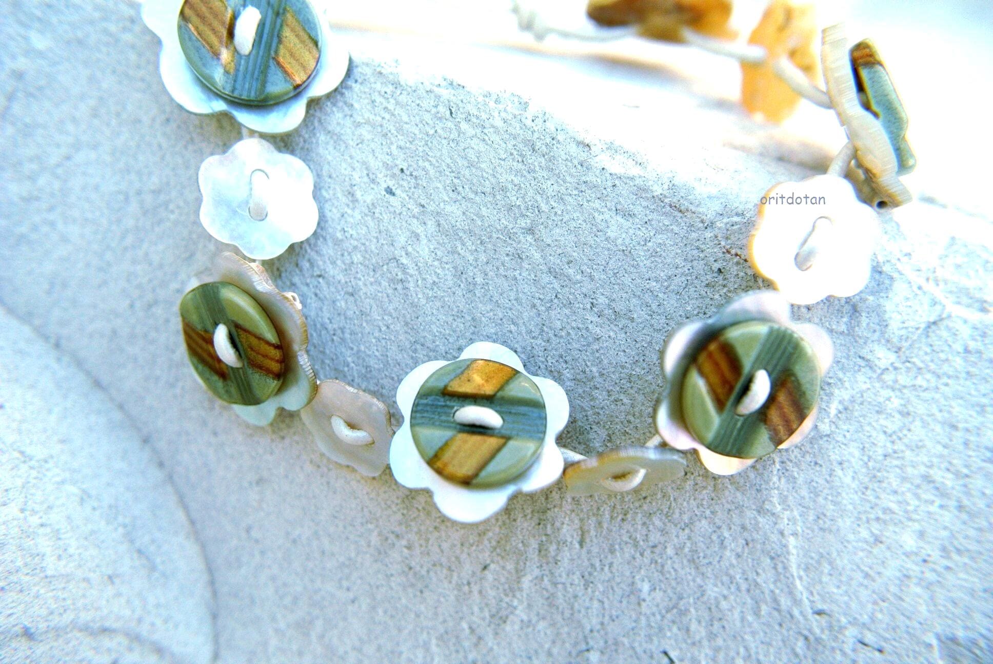 Vintage Button Bracelet: Shell & Celluloid Flowers, Silver Cord - Etsy