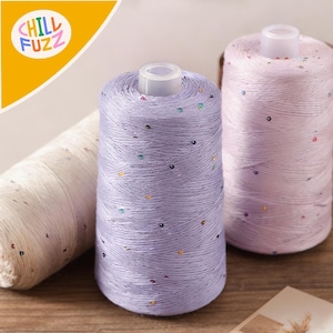 May include: A white ceramic mug with a black handle and the text "But First, Coffee" in a bold, black font. The mug is set against a neutral background, highlighting its simple design.