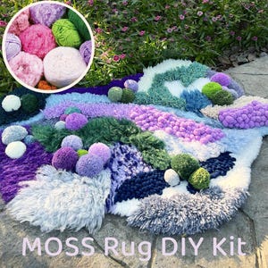 May include: A handmade moss rug DIY kit with a variety of textures and colors, including purple, green, blue, and white. The rug is adorned with pom-poms and a circular inset of yarn balls. The text "MOSS Rug DIY Kit" is at the bottom.