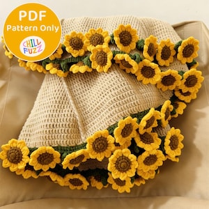 May include: A beige crochet bucket hat adorned with yellow and brown sunflowers and green leaves. The hat features the text "PDF Pattern Only" and "Chill Fuzz" in a yellow circle. The hat is displayed on a neutral surface.