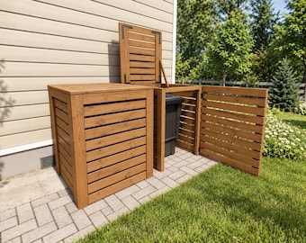 May include: A brown wooden outdoor storage enclosure featuring horizontal slats and a hinged lid. The structure consists of two connected units, one with a closed front and one with an open front, designed to conceal a dark gray plastic waste bin.