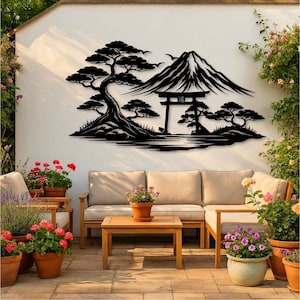 May include: Black metal wall art depicting a Japanese landscape scene. The artwork features a mountain, trees, a traditional gate, and birds. The scene is set against a white wall, creating a striking contrast. The art is suitable for outdoor or indoor decor.