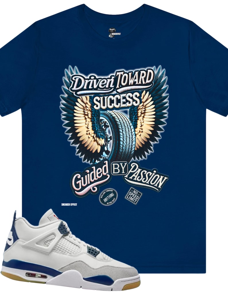 May include: A pair of white and grey sneakers with blue accents. The sneakers have a gum sole and are sitting on a blue t-shirt with a graphic of a tire with wings and the text "Driven Toward Success Guided By Passion".
