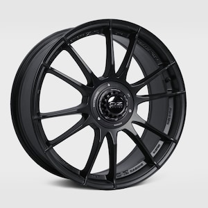 May include: Black OZ Racing forged aluminum alloy wheel with a 10-spoke design. The wheel has a black finish and a silver OZ Racing logo.