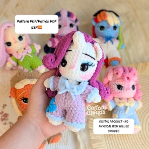 May include: A collection of handmade crochet dolls in various colors. The dolls include a bunny, a pony with purple hair, and other characters. The dolls are wearing outfits in shades of pink, blue, and green. The image includes the text "Pattern PDF" and "Digital Product - No Physical Item Will Be Shipped."