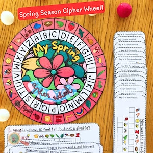 以下が含まれることがあります： 花柄のデザインと「My Spring Cipher Wheel」という文字が書かれた、カラフルな春のテーマの暗号ホイール。ホイールは外側に文字、内側に春のアイテムの絵が描かれています。春の謎のヒントと答えが書かれたカードもあります。