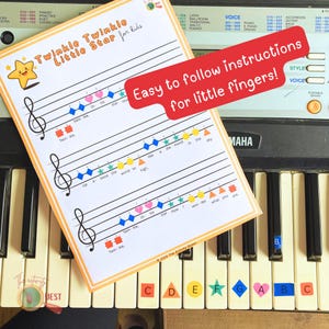 May include: A sheet music page for "Twinkle Twinkle Little Star for kids" with colorful shapes and notes, placed on a piano keyboard. The text "Easy to follow instructions for little fingers!" is also visible.