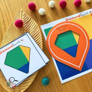 May include: A set of printable diamond hunt game cards. The cards feature a diamond shape with different coloured sections. The text "Diamond Hunt" is written on the cards.