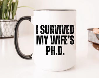 Funny PhD Graduation Mug: I Survived My Wife's Doctorate